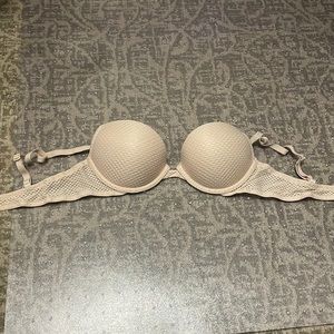 I am selling this because it does not fit me anymore. The colour of it is cream.